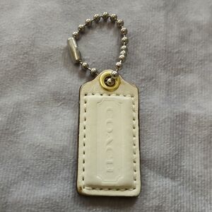 Coach cream color leather accessory